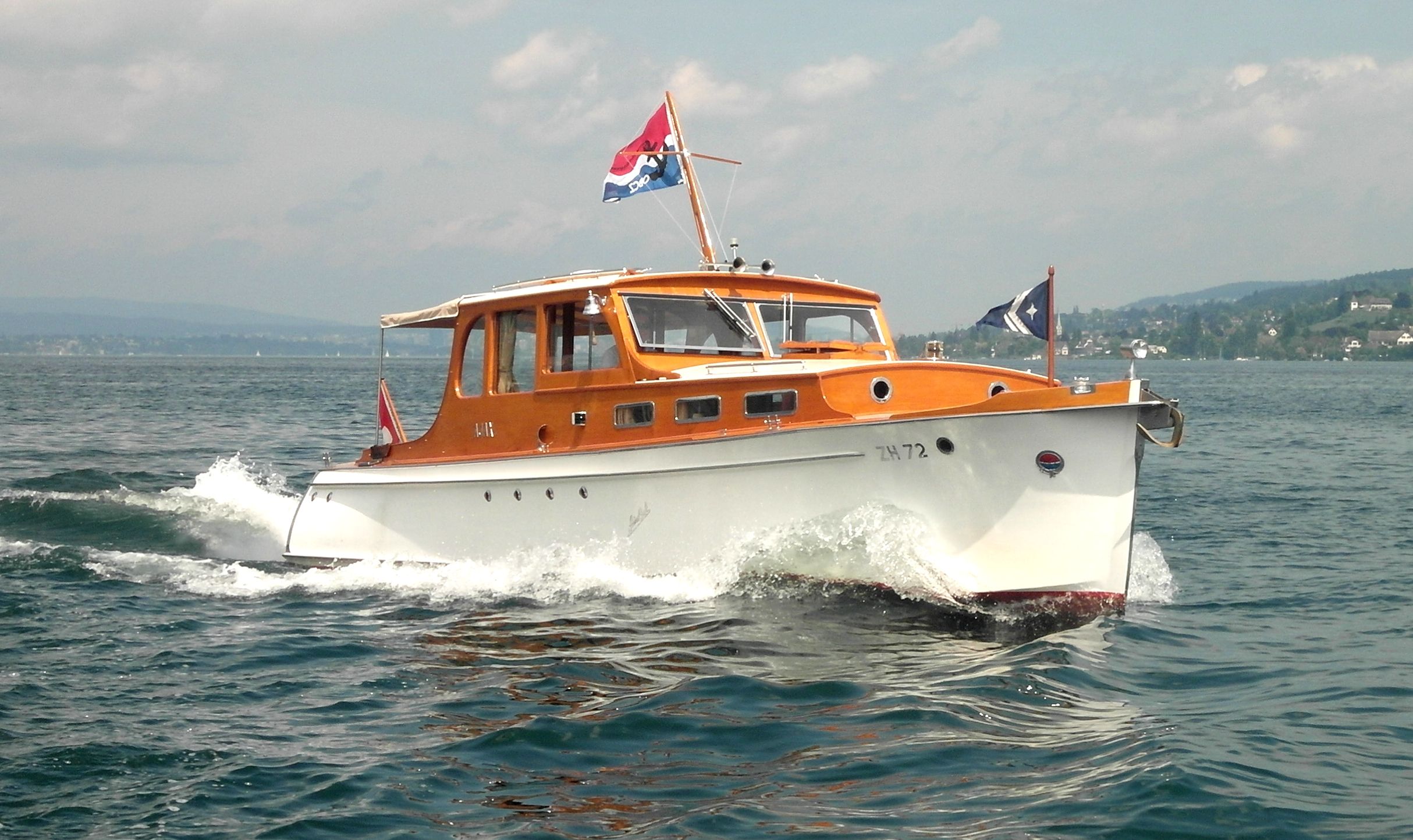 Fahrten ab Hafen Horgen zur Halbinsel Au mit dem Motorboot AJAX (1936)